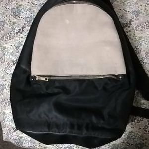 Black gold and gray zipper backpack